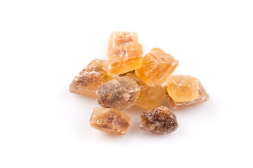 Brown caramelized lump cane sugar cube