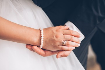 Obraz na płótnie Canvas Groom Put the Wedding Ring on bride