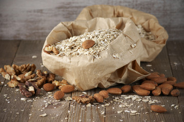 Oatmeal with nuts in paper bag