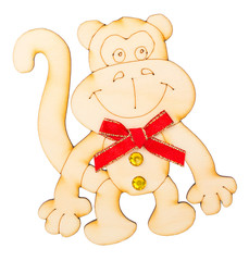 wooden shape in the form of a monkey with a red butterfly decora