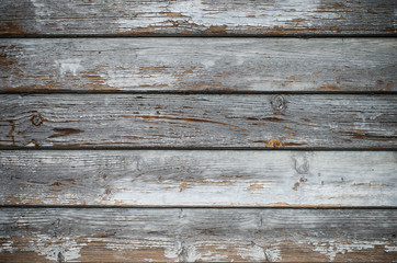 old weathered planks covered with grey impregnation