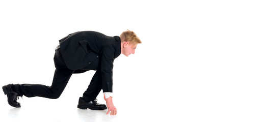 businessman in black suit in start position