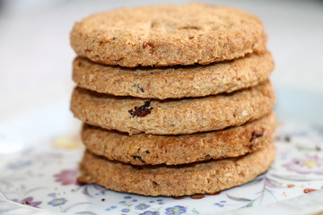 Fresh oatmeal cookies with seeds of cereals and raisins 