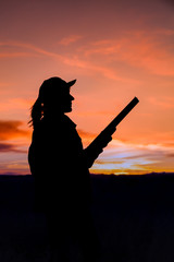 Hunter Silhouetted at Sunset