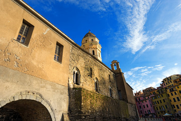 Vernazza Liguria Italy / Vernazza village with the church of Santa Margherita di Antiochia. Cinque terre, national park in Liguria Italy. UNESCO world heritage site