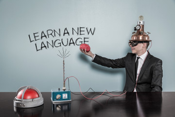 Learn a new language concept with businessman holding brain
