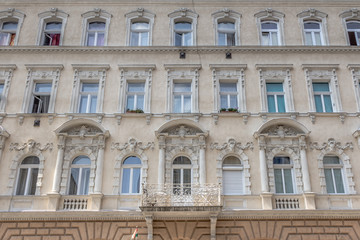 Facade of an old appartment buidling in Budapest Hungary with a