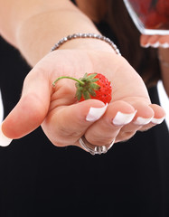 Young woman with strawberries