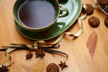 hot winter tea with ginger cookies and christmas decoration