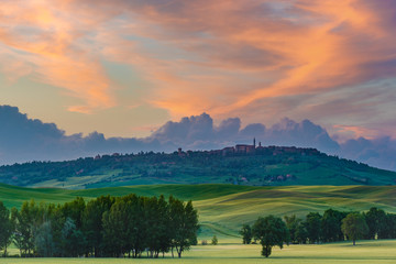 The medieval town of Pienza at colorful sunset
