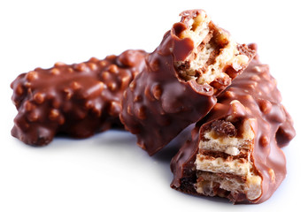 broken crispy candy bars, isolated on white