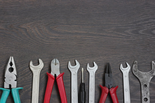 Set of tools against a dark background.