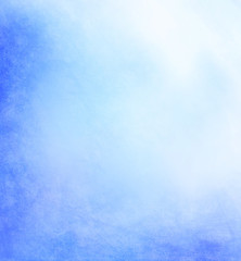 pale abstract blue background with yellow center and soft pastel