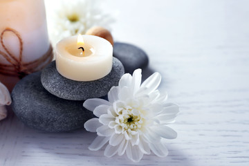 Beautiful composition of spa treatment on a white wooden table