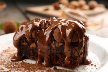 A piece of chocolate cake on the table, close-up
