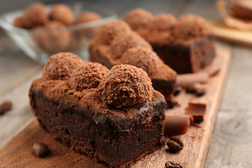 Pieces of chocolate cake on the table, close-up