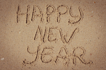 New year written on the sand