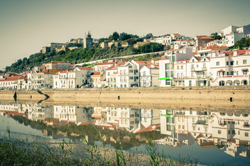 Fototapeta na wymiar View of city Alcacer do Sal near the river Sado in Portugal
