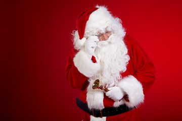 Christmas Santa Claus portrait over red background