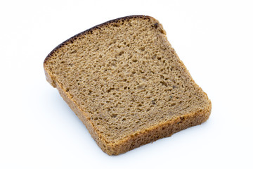 Dark rue bread on a white background.