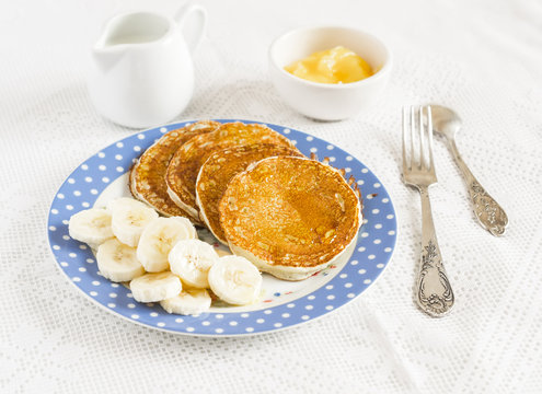 Banana pancake. Delicious breakfast. On a light surface