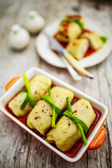 Stuffed cabbage with meat and rice in tomato sauce