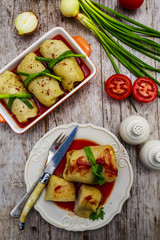 Stuffed cabbage with meat and rice in tomato sauce
