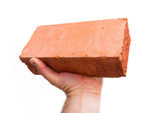 Fototapeta Hand hold red brick isolated