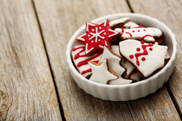 Gingerbread cookies on a grey wooden table