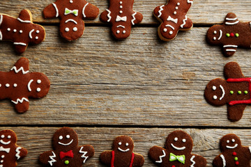 Gingerbread cookies on a grey wooden table