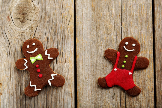 Gingerbread cookies on a grey wooden table