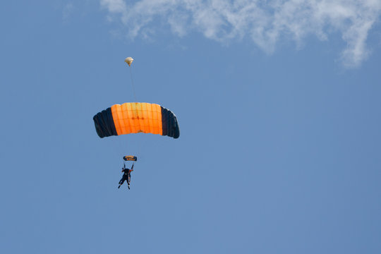 Orange and black parachute