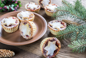 Mince pies with Christmas tree branch