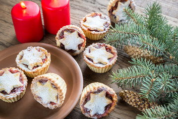 Mince pies with Christmas tree branch