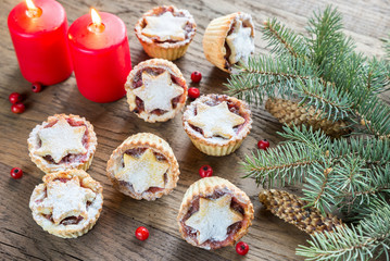 Mince pies with Christmas tree branch
