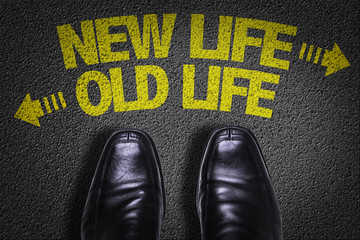 Top View of Business Shoes on the floor with the text: New Life - Old Life