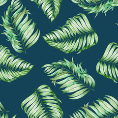 A seamless pattern with the branches of the leaves of a palm painted in watercolor on a dark blue (indigo) background