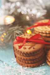 stack of cookies with a red bow, tinted