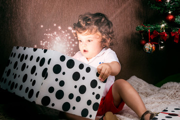 Baby with a gift box