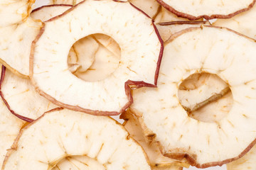 background of dried apple slices, close up
