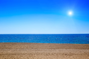 Fototapeta na wymiar sea beach blue sky sand sun daylight relaxation landscape viewpo