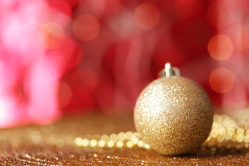Christmas ball on abstract shiny background