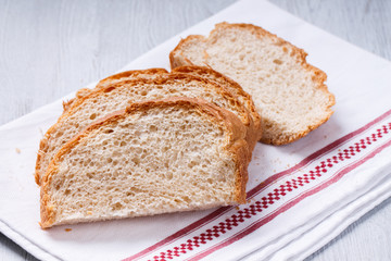 loaf of white,wheat,fresh bread,homemade.Sliced loaf of bread.selective focus