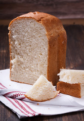 loaf of white,wheat,fresh bread,homemade.Sliced loaf of bread.selective focus