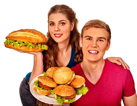 Man And Woman Eating Big Sandwich With Cola.  Isolated.