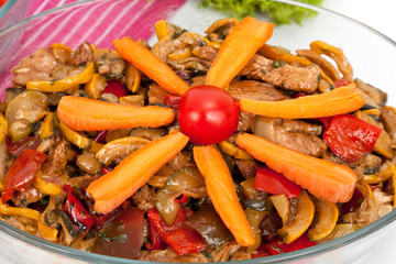 pieces of meat with vegetables