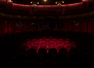 Red seats in a theater - 97469981