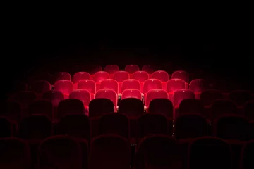 Foto op Aluminium Lights on red seats in a theater © pink candy