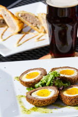 pub appetizers and a dark beer