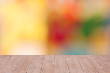 Naklejka na ściany i meble Wood table top on color abstract blurred background. ready for product display